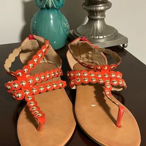 Stripy, orange, and gold sandals